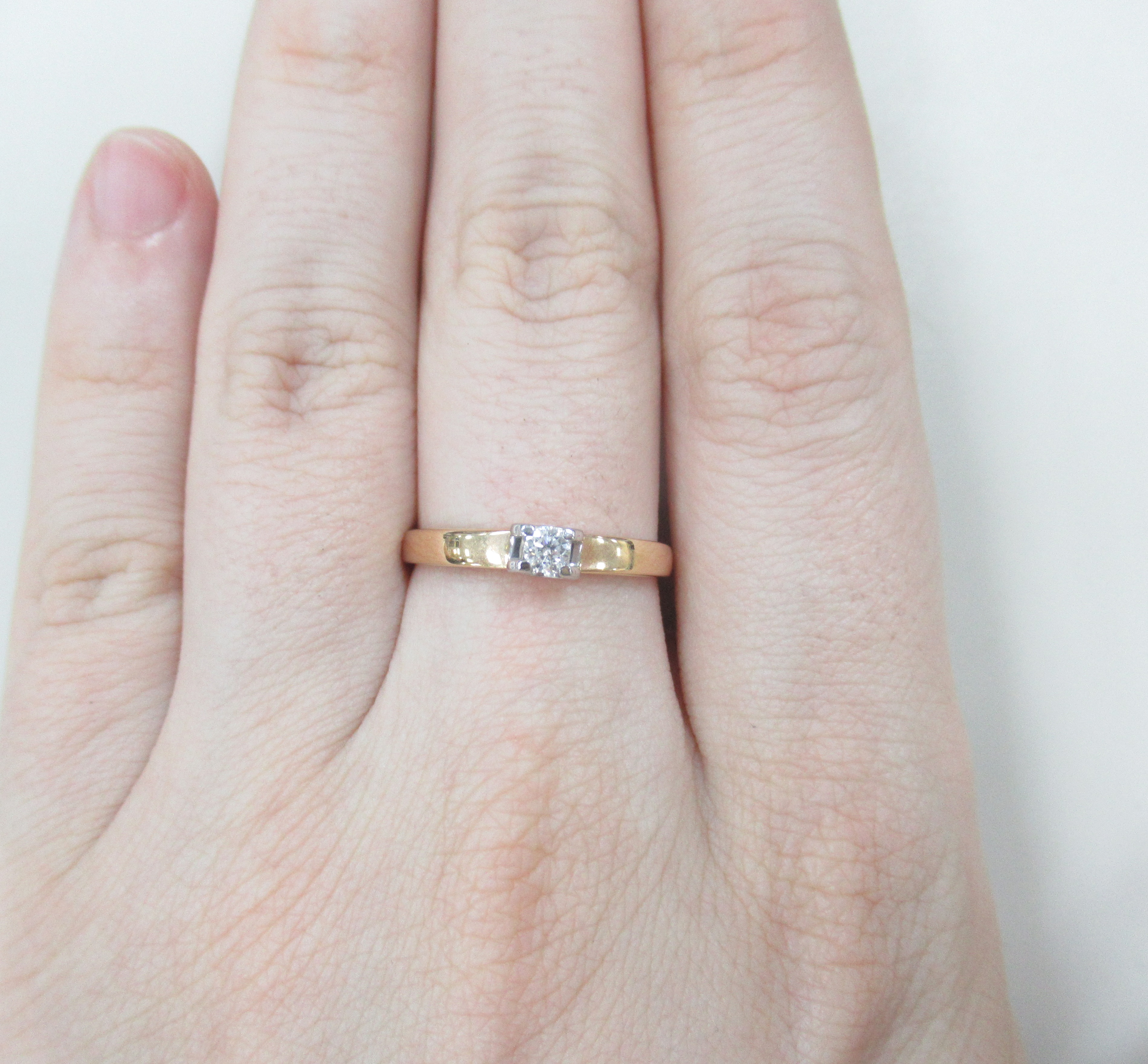 Золотое кольцо 585 пробы; родий; вставки 1 Бр.Кр-57 0,107 3/6А